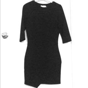 Classic black dress, soft material, above the knee